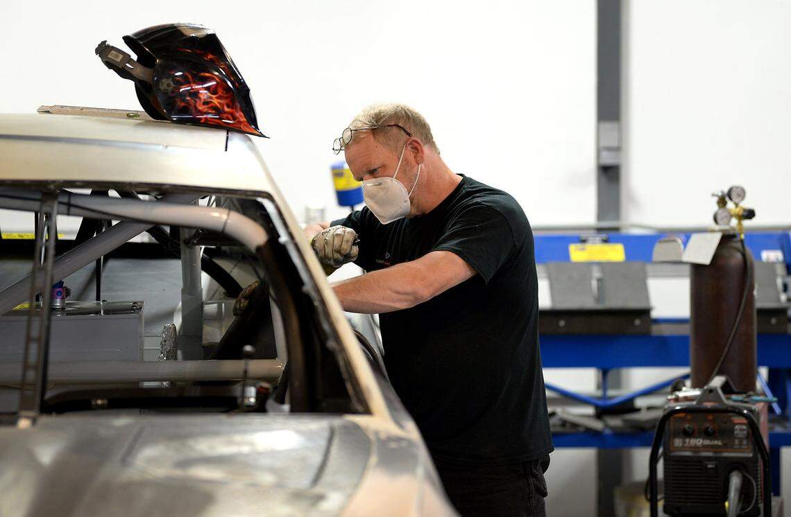 Greg Carpenter, the head body hanger for NASCAR driver Corey LaJoie’s No. 32 Ford Mustang for Go Fas Racing team works on a car at the team’s race shop on Tuesday, May 5, 2020. The team is preparing for the first race at Darlington Raceway in Darlington, SC on Sunday, May 17, 2020.