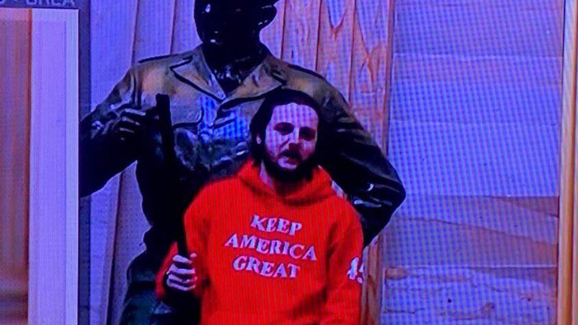 Grayson Sherrill, 23, of Cherryville poses inside the U.S. Capitol on Jan. 6, 2021 next to a statue of Gen. Dwight Eisenhower. He pleaded guilty in federal court on Friday to assaulting a police officer. He will be sentenced May 1. Photo courtesy of the U.S. Department of Justice.