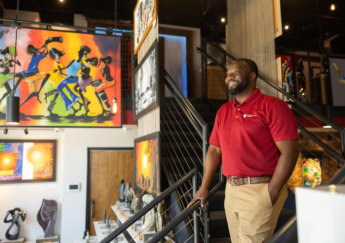 Cal Ganda poses for a portrait at Real African Art Gallery in Charlotte, N.C., on Friday, June 6, 2025.