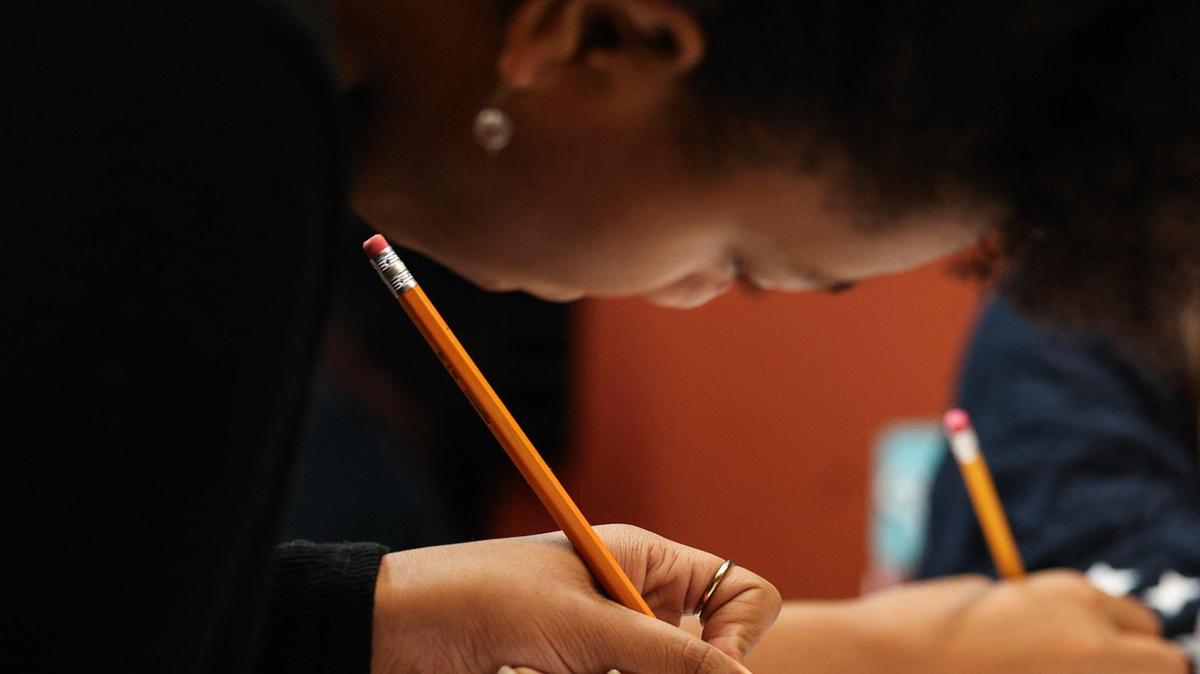Naomi Rivers, 14, writes from a prompt that was given by an instructor during Inkspill, a writing club for youths ages 12 to 18 who want to engage in creative writing.