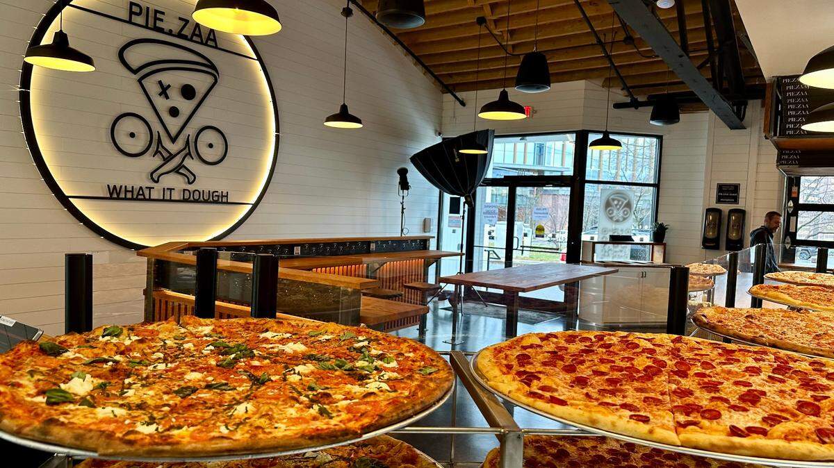 PIE.ZAA has whole pies and single slices of pizza on its menu.