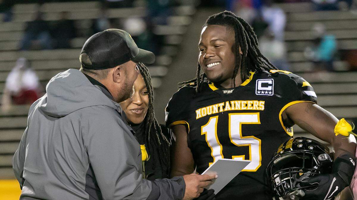 Kings Mountain head coach Greg Lloyd honored star AJ Richardson on Senior night Friday