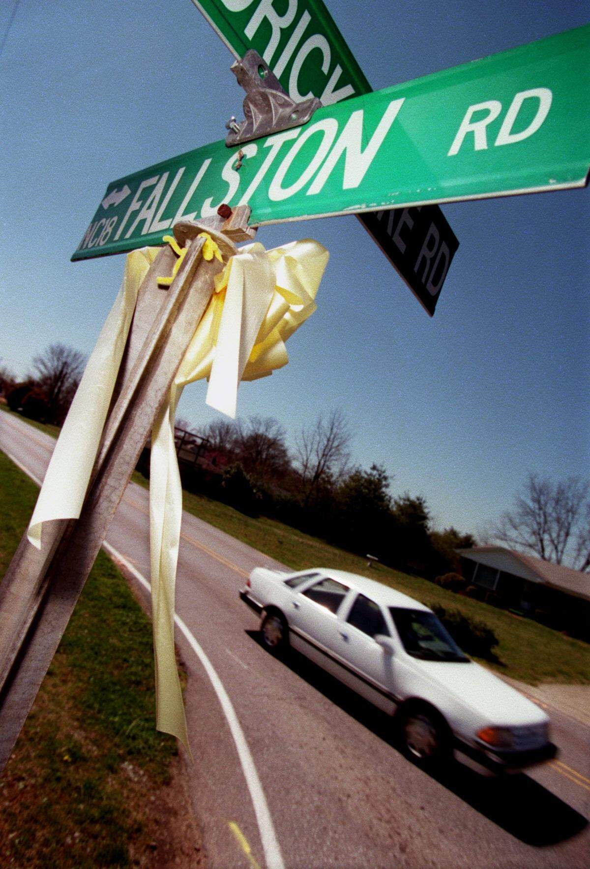 It’s been one month since nine-year-old Asha Degree disappeared after she left her home on Feb. 14, 2000 and was seen walking along NC Hwy 18 north of Shelby in rural Cleveland County. Yellow ribbons hang from street signs on Hendrick Lake Road and on Hwy 18 on March 13, 2000.