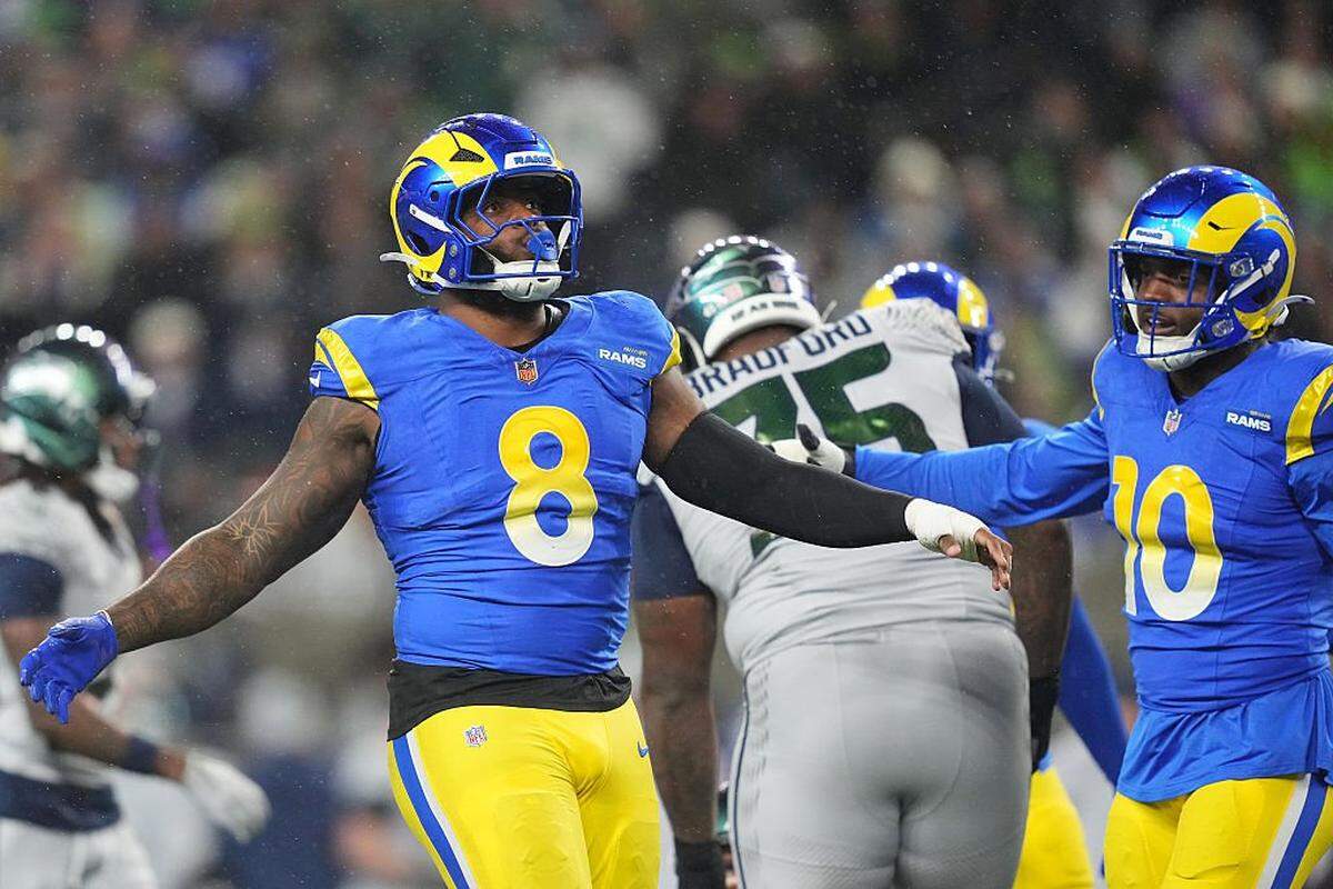 Jared Verse of the Los Angeles Rams celebrates a tackle against the Seattle Seahawks at Lumen Field on Dec. 18, 2025 in Seattle, Washington.