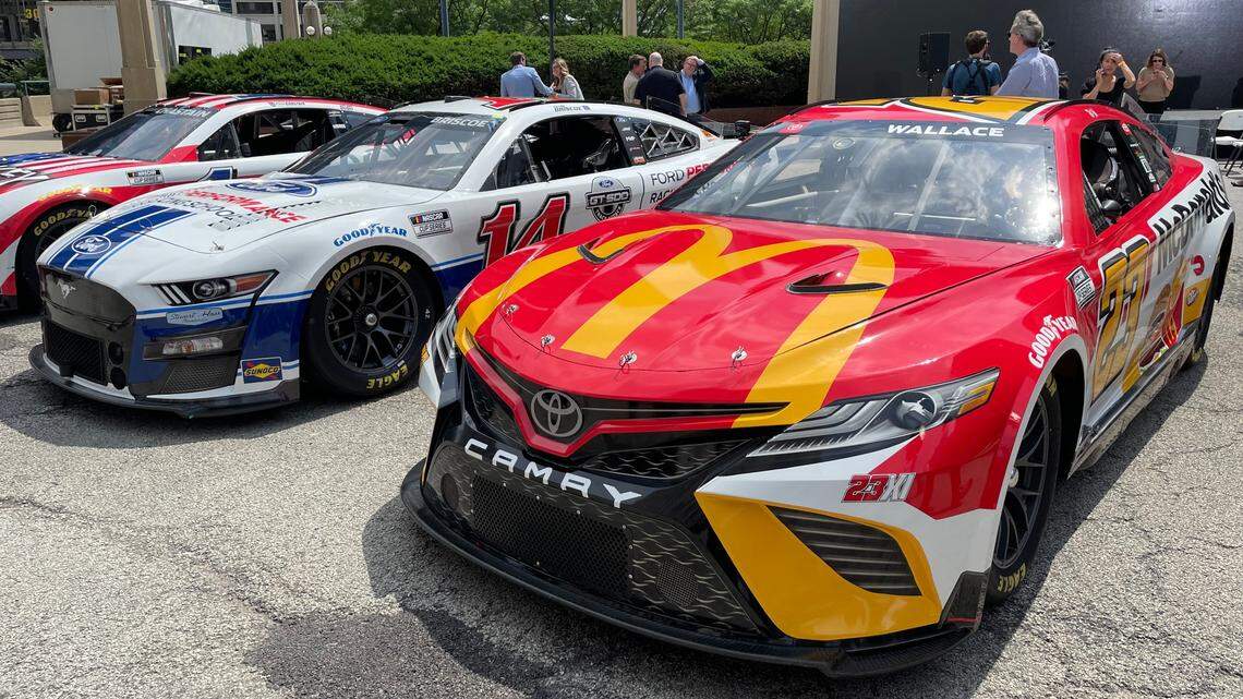 NASCAR Cup Series cars of Bubba Wallace (23), Chase Briscoe (14) and Ross Chastain (1) lined up in Chicago ahead of the announcement that NASCAR will run a street race in the city in 2023.