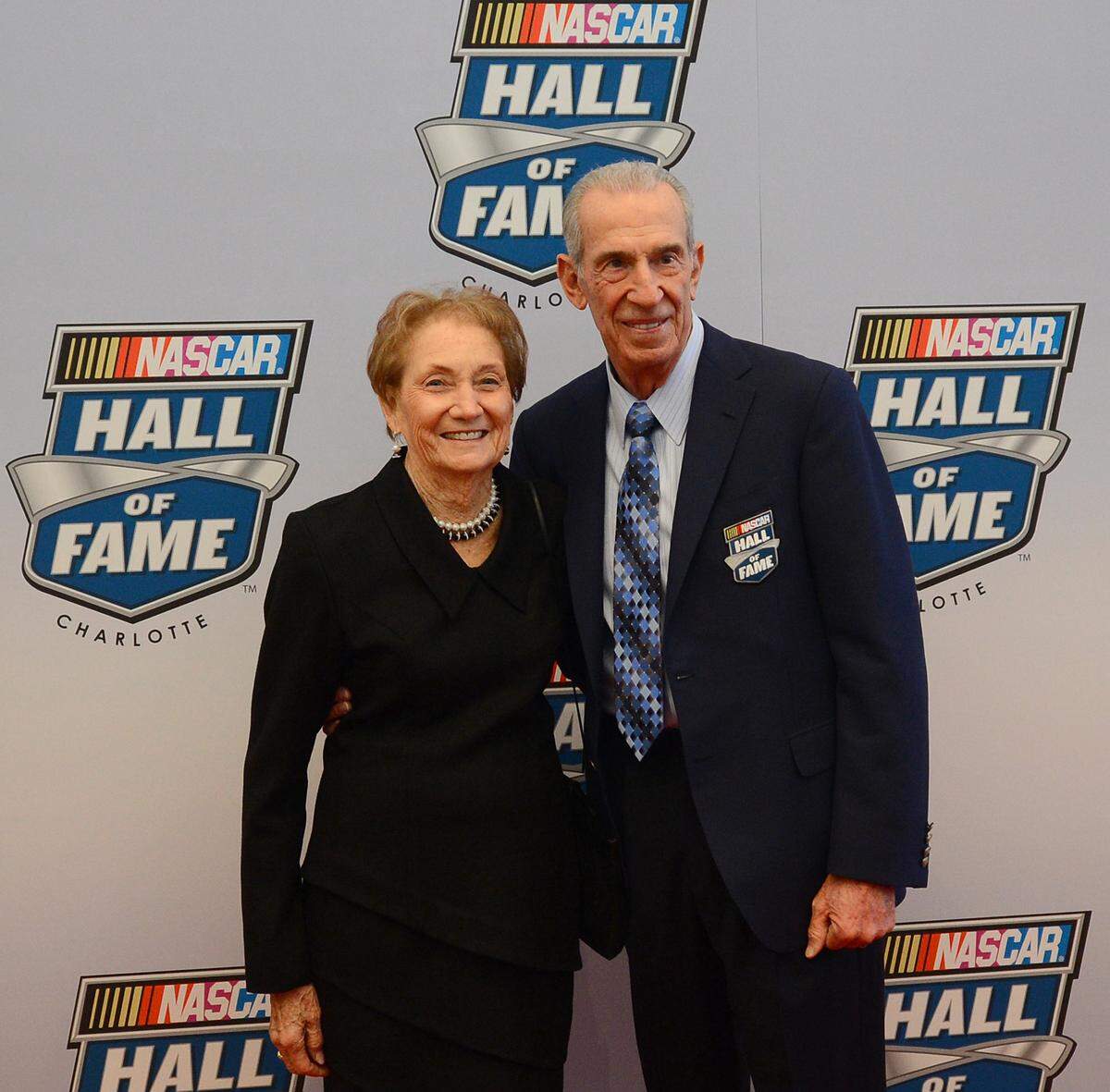 (Right-Left) NASCAR Hall of Fame member Ned Jarrett  and his wife, Martha Jarrett walk the red carpet prior to the NASCAR Hall of Fame Induction Ceremony on Wednesday, January 29, 2014. 