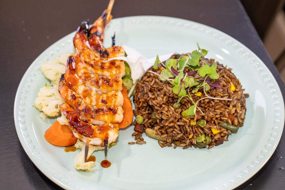 Chofan is a fried rice dish with grilled shrimp and vegetables served at República Restaurant & Lounge in Matthews.