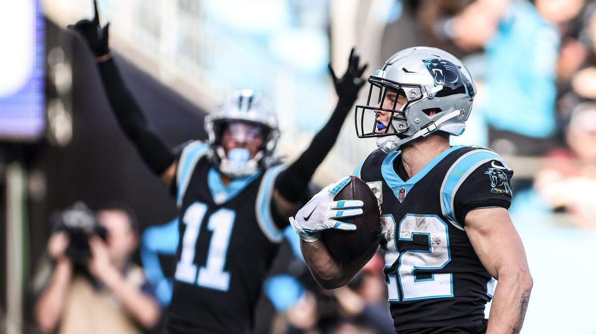 Carolina Panthers Christian McCaffrey makes a touchdown against the Washington Football Team at the Bank of America Stadium in Charlotte, N.C., on Sunday, November 21, 2021.