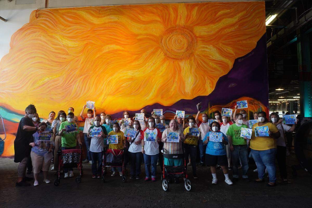 Holy Angels residents and staff viewed the Van Gogh exhibit, then created their own “Starry Night” paintings.