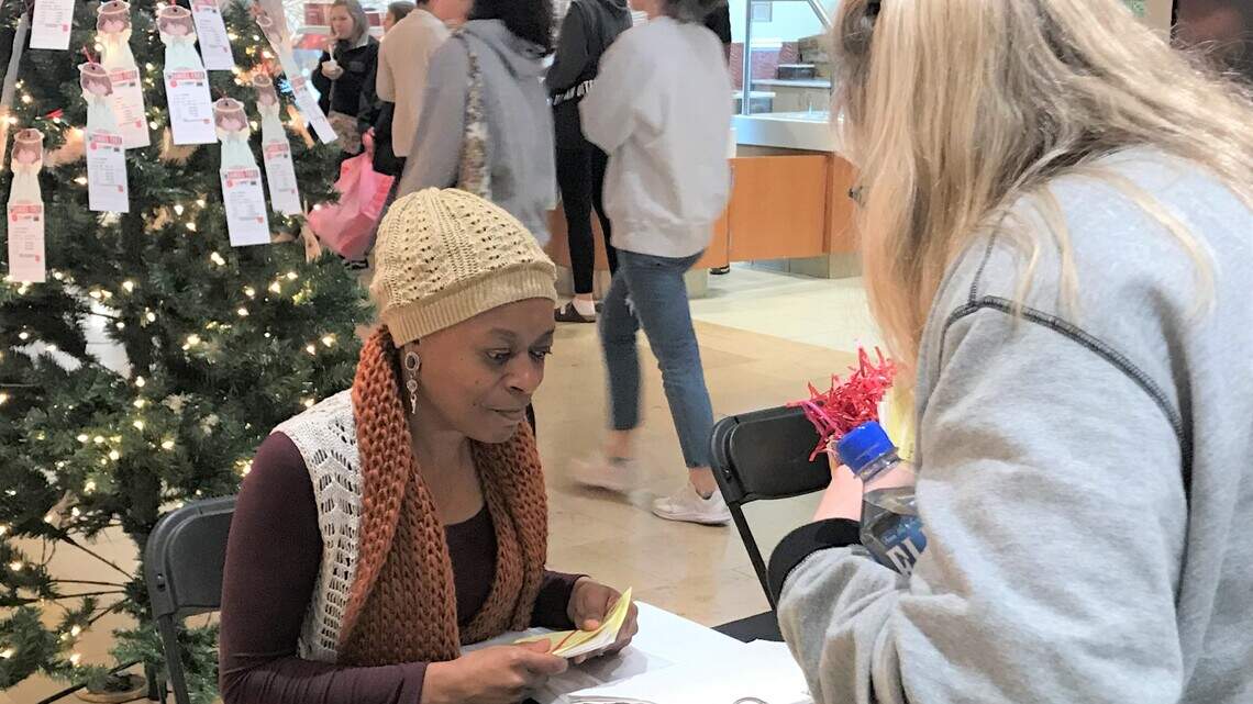 She hits the mall every Black Friday — not to shop, but to give back