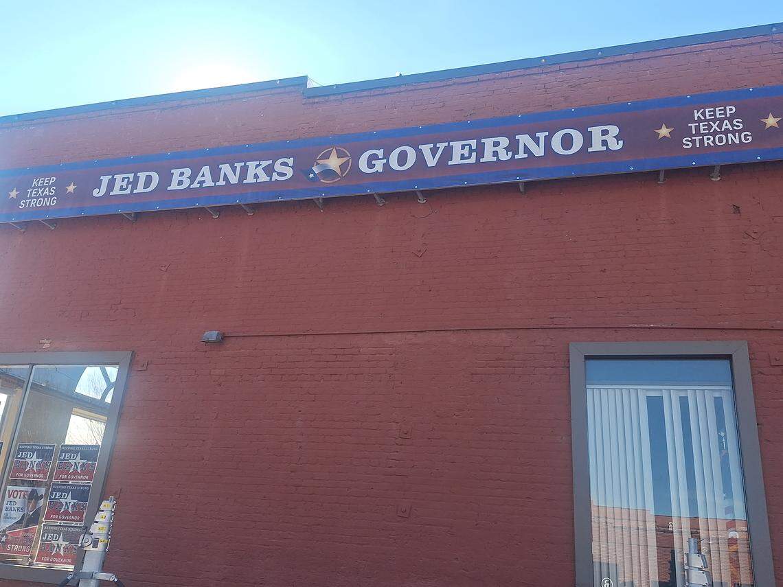 A Jed Banks banner appeared across the top of a building in downtown Mooresville on Tuesday.