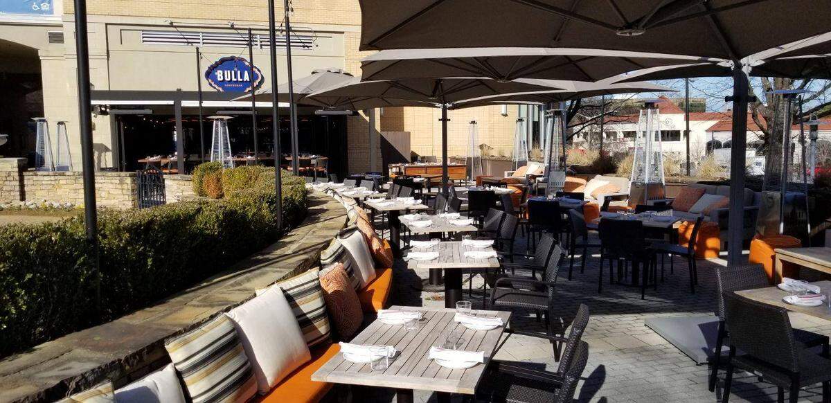 A spacious patio sits behind Bulla Gastrobar.