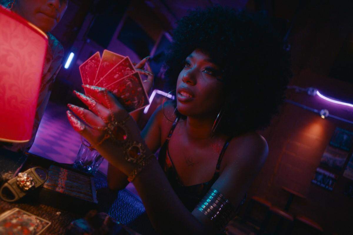 “Llueve sobre Babel,” (Rains Over Babel) from Colombia. It’s a retro-futuristic, tropical-punk twist on Dante’s “Inferno,” where a group of misfits converge at Babel, a legendary dive bar that doubles as purgatory. And the city’s Grim Reaper presides over the bar.