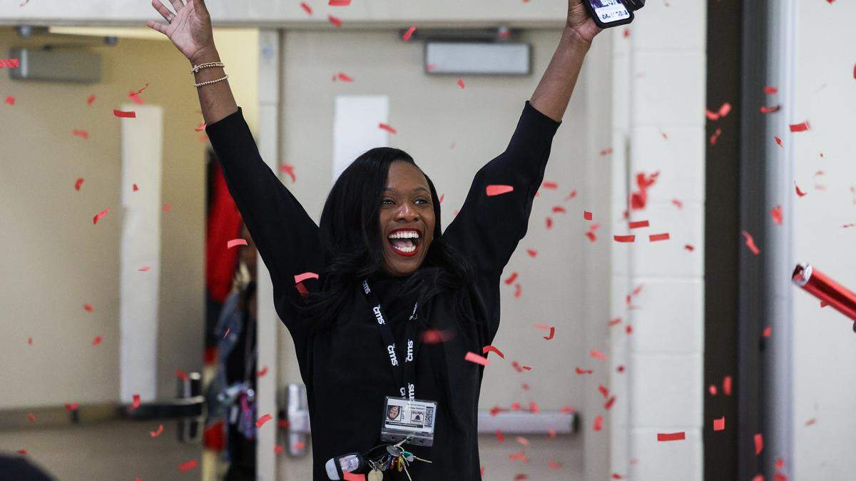 Tuckaseegee Elementary's Principal LaTresha Wilson is surprised with the annoucement that she is the regional 2026 Principal of the Year on Tuesday, December 16, 2025.