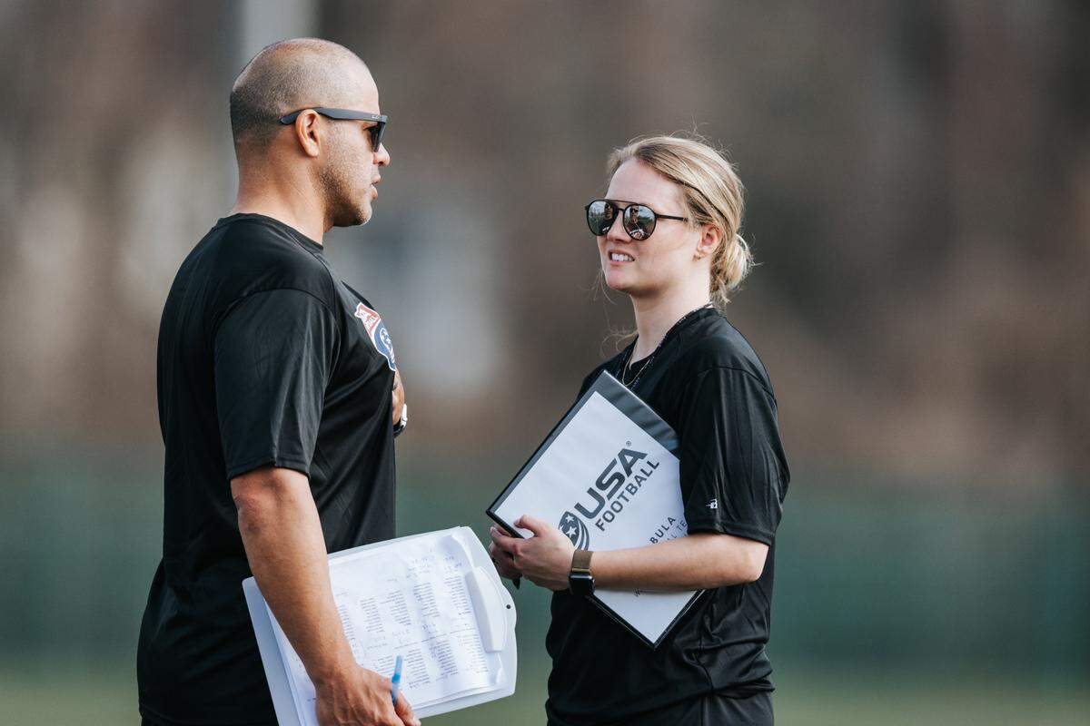 USA Football assistant coach Mary Kate Bula, right, on Day 2 of the US National Team Trials, hosted by USA Football, at the UNC Charlotte campus in Charlotte, N.C.
