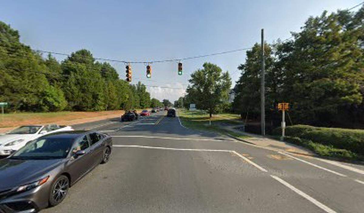 Police arrested a 24-year-old man accused of shooting at a driver in a road rage incident near West Catawba Avenue and Westmoreland Road in Cornelius NC on Wednesday, May 10, 2023.