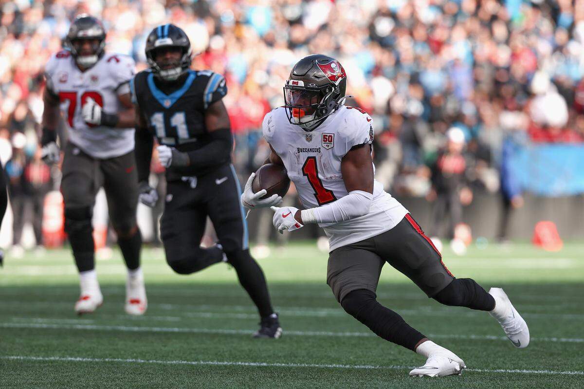 Tampa Bay Buccaneers running back Rachaad White carries the ball against the Carolina Panthers during the third quarter at Bank of America Stadium on Dec. 21, 2025 in Charlotte, North Carolina. (Photo by David Jensen/Getty Images)