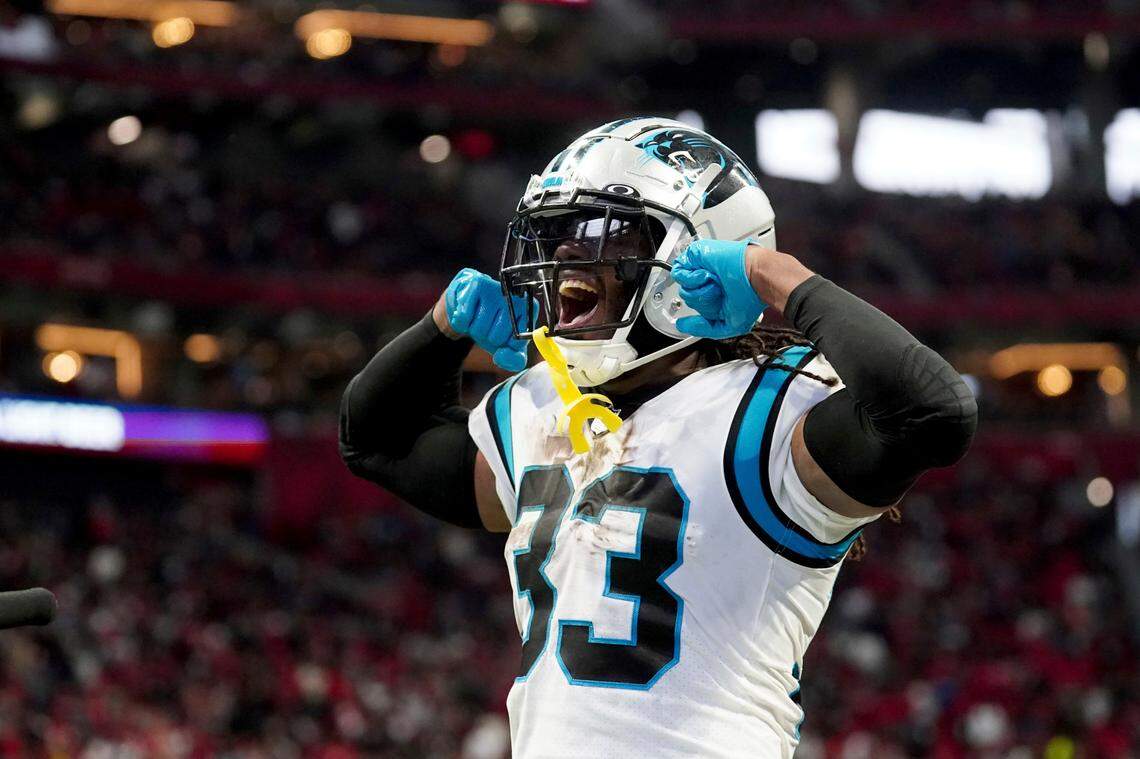 Carolina Panthers running back D’Onta Foreman celebrates after scoring on a 1-yard run during the second half of an NFL football game against the Atlanta Falcons Sunday, Oct. 30, 2022, in Atlanta. (AP Photo/John Bazemore)