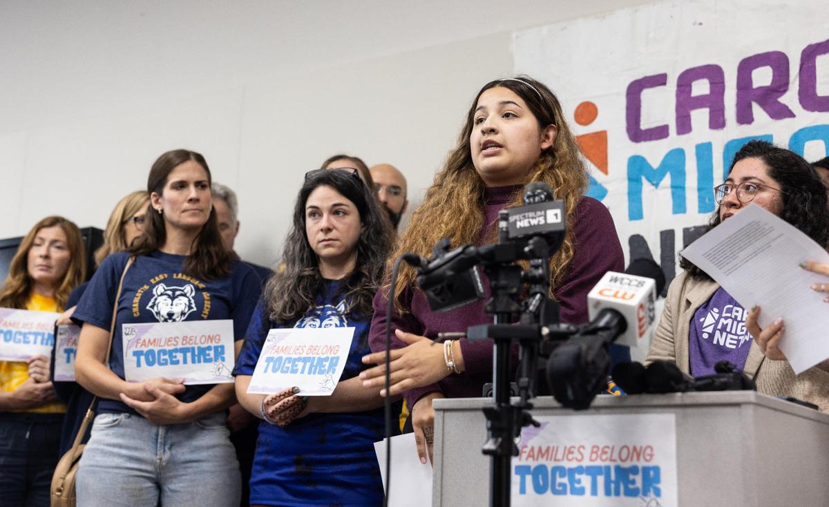 Joanna Martinez talks about her father, Jose, who was detained by ICE, during a press conference in Charlotte on Monday.