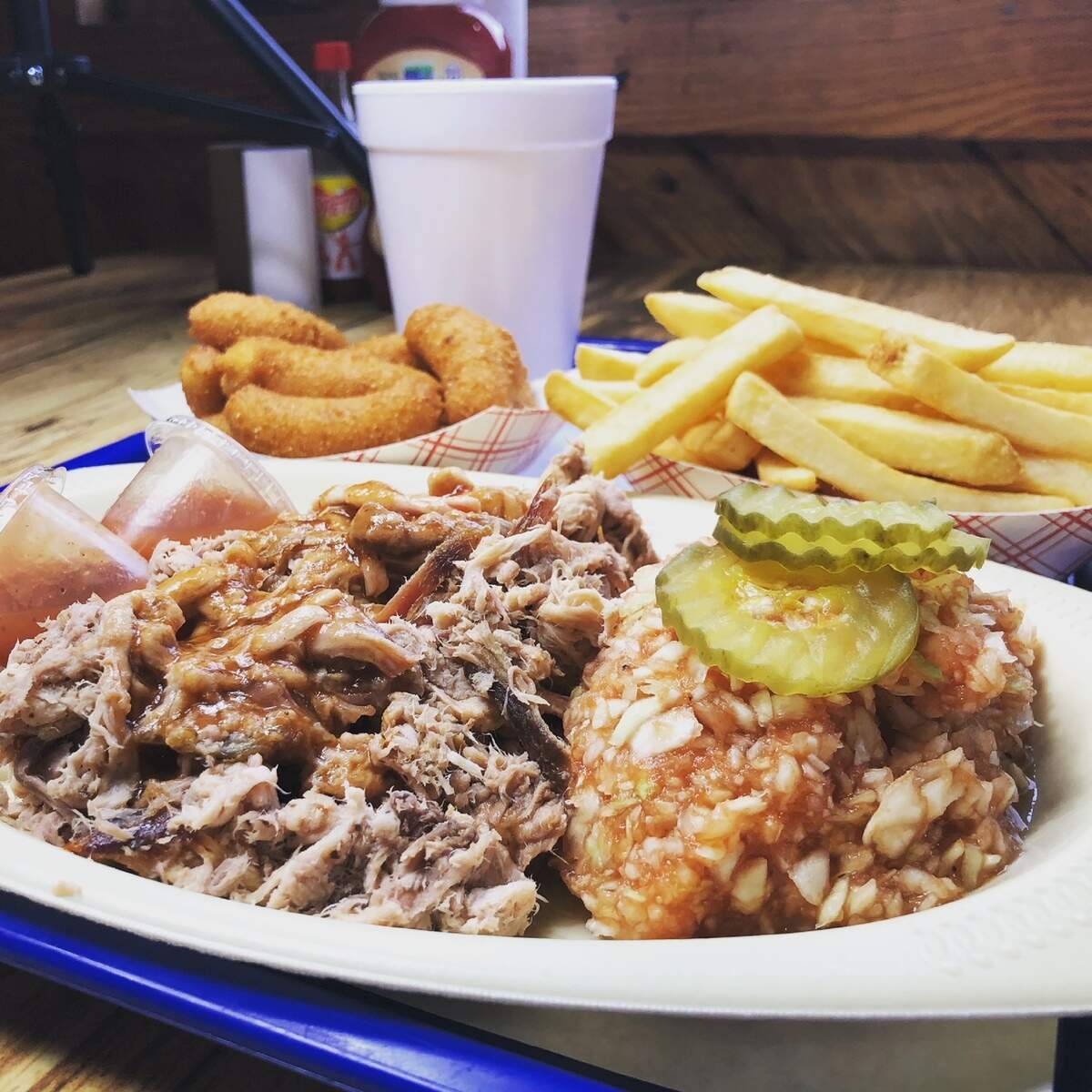 Bar-B-Q King sells 25 pork shoulders, 180 pounds of hamburger and 200 pounds of onions each day.