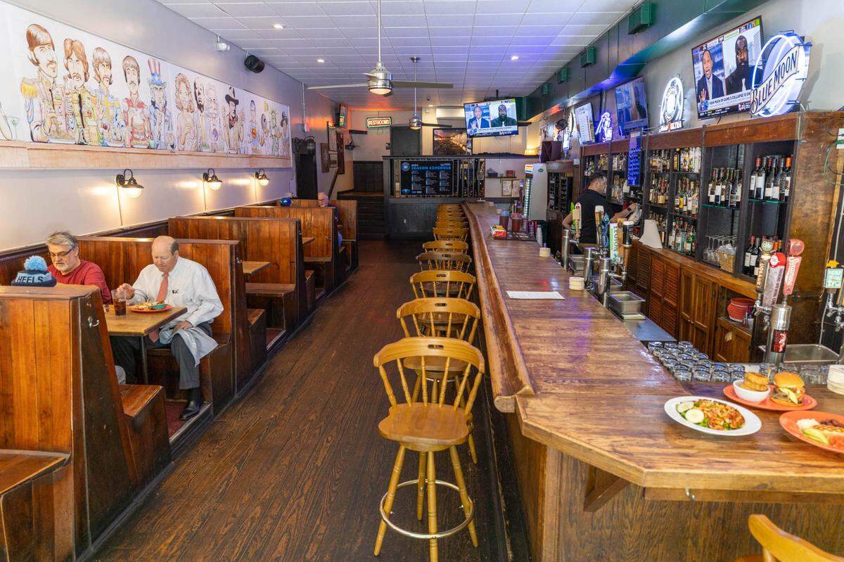 The original space at Providence Road Sundries, which first opened in 1933, features a mural by John Tomlinson.