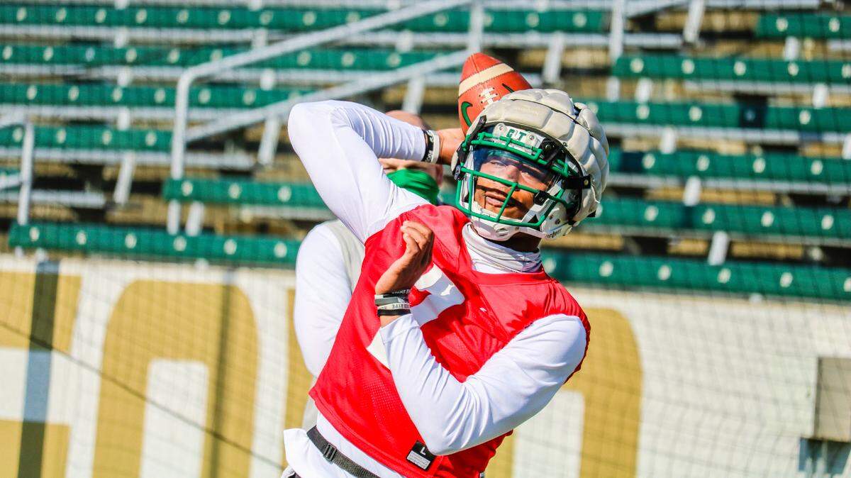 New Charlotte 49ers quarterback James Foster throws a pass during spring practice at Richardson Stadium in Charlotte, NC.