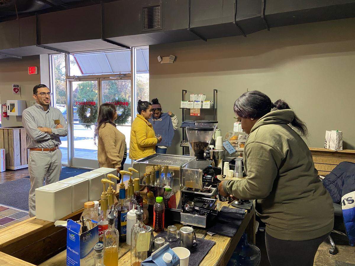 Customers line up at Neighborhood Coffee.