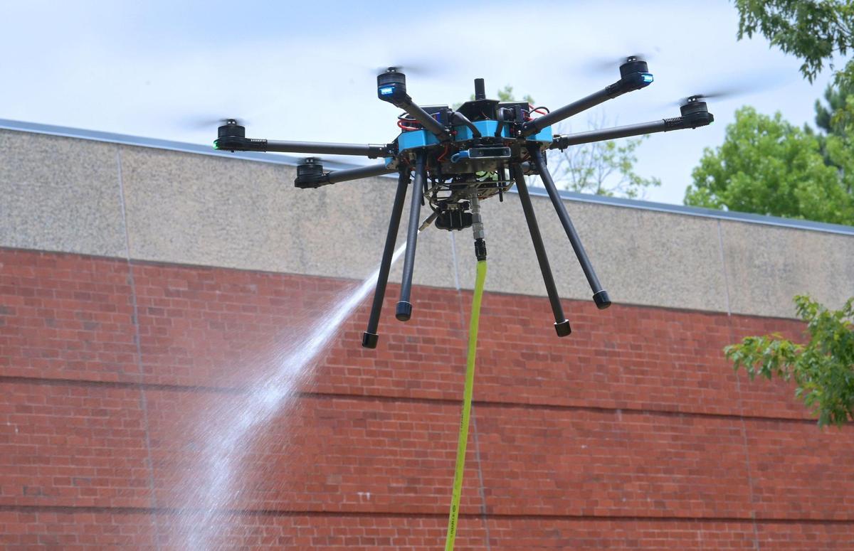 A C1 Cleaning Drone demonstrates its ability in cleaning buildings and windows Friday. The drone is built by Lucid Drone Technologies in Charlotte.
