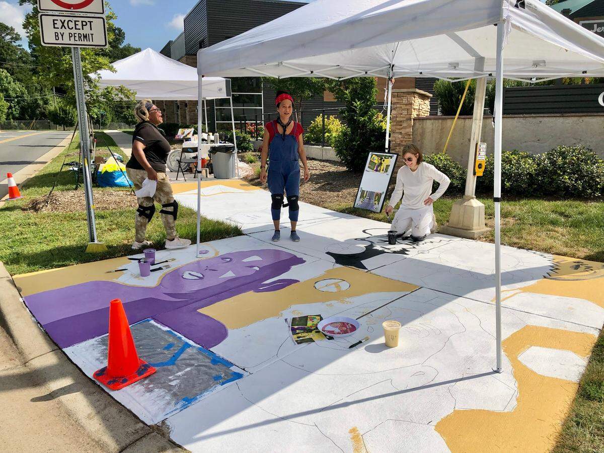 Look for sidewalk artwork in MoRa as part of Patchwork Crosswalks.