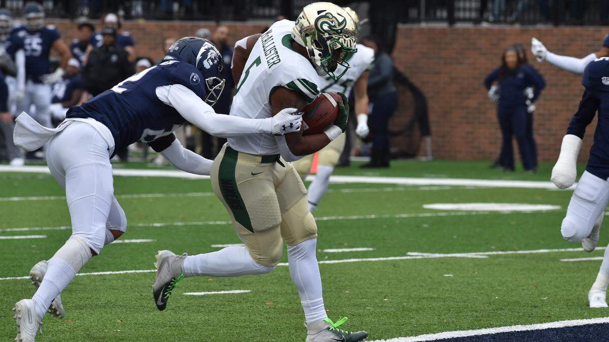 Aaron McAllister (5) scores for the Charlotte 49ers in their 36-22 victory Saturday against Old Dominion. SAM ROBERTS