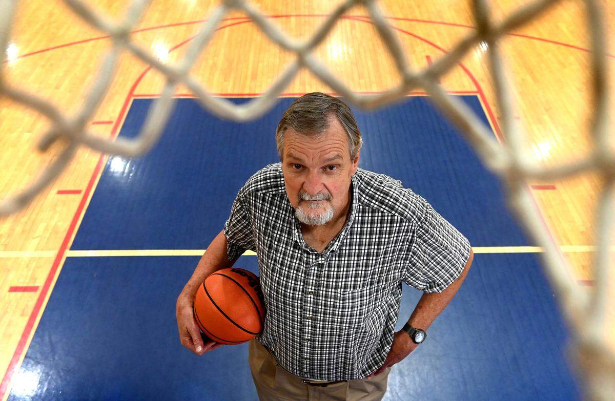 Former North Carolina State center Tommy Burleson on Thursday, July 6, 2023, in Denver, N.C. Burleson and his Wolfpack teammates, including David Thompson and Monte Towe, won the 1974 NCAA championship, defeating UCLA and Bill Walton in the semifinals. Burleson was also a member of the 1972 U.S. Olympic basketball team.