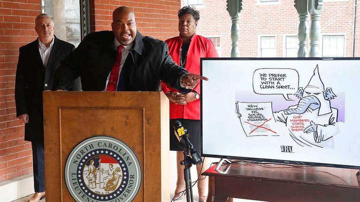 Lt. Gov. Mark Robinson spoke out Tuesday against a WRAL editorial cartoon that depicted Republicans on the State Board of Education as members of the KKK. Democrats on the board want teachers to acknowledge systemic racism and talk to students about racial and gender discrimination. Robinson and other Republicans on the board disagree.