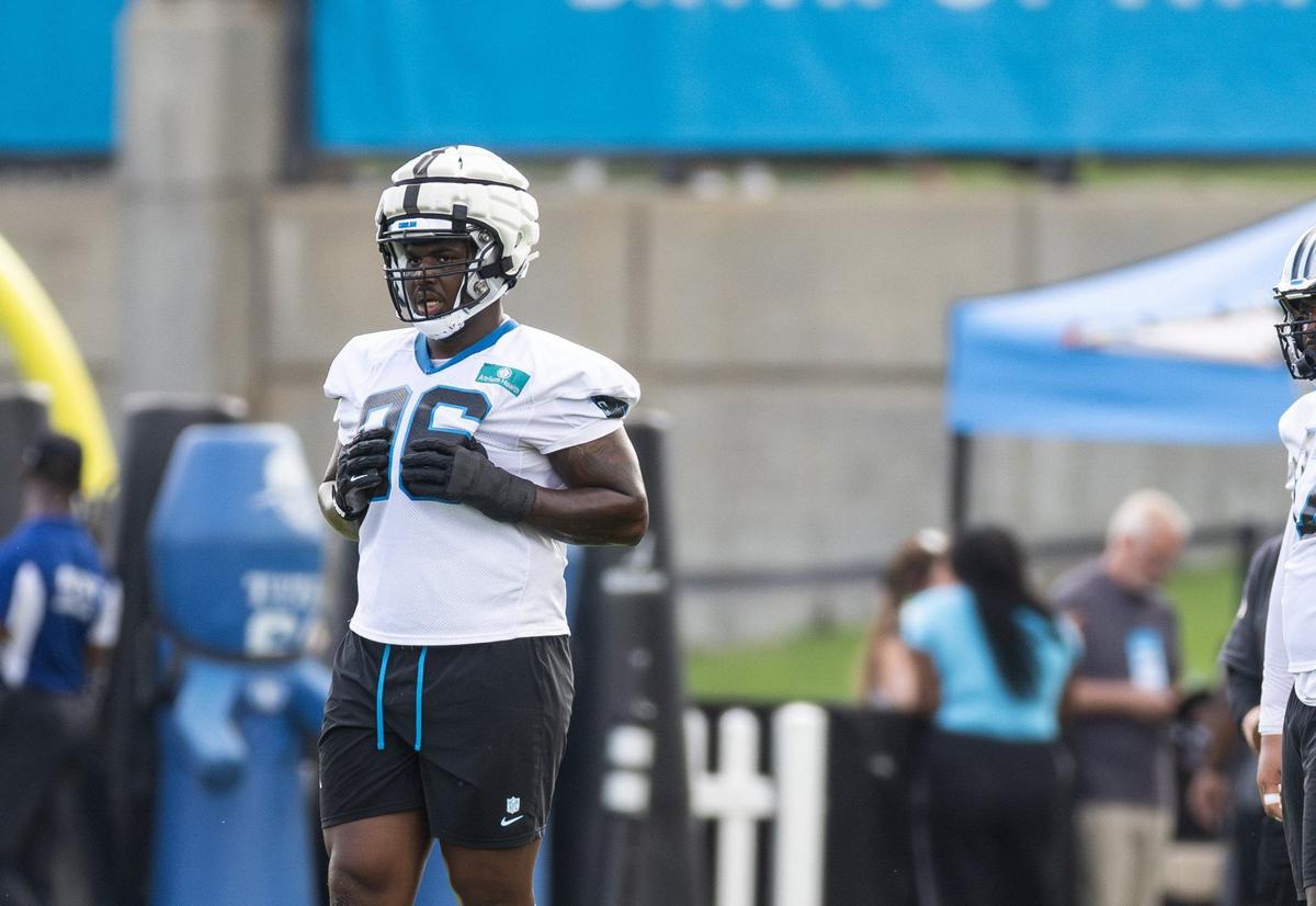 Carolina Panthers Jaden Crumedy holds onto his jersey during the Carolina Panthers Training Camp in Charlotte, N.C., on Monday, August 5, 2024.