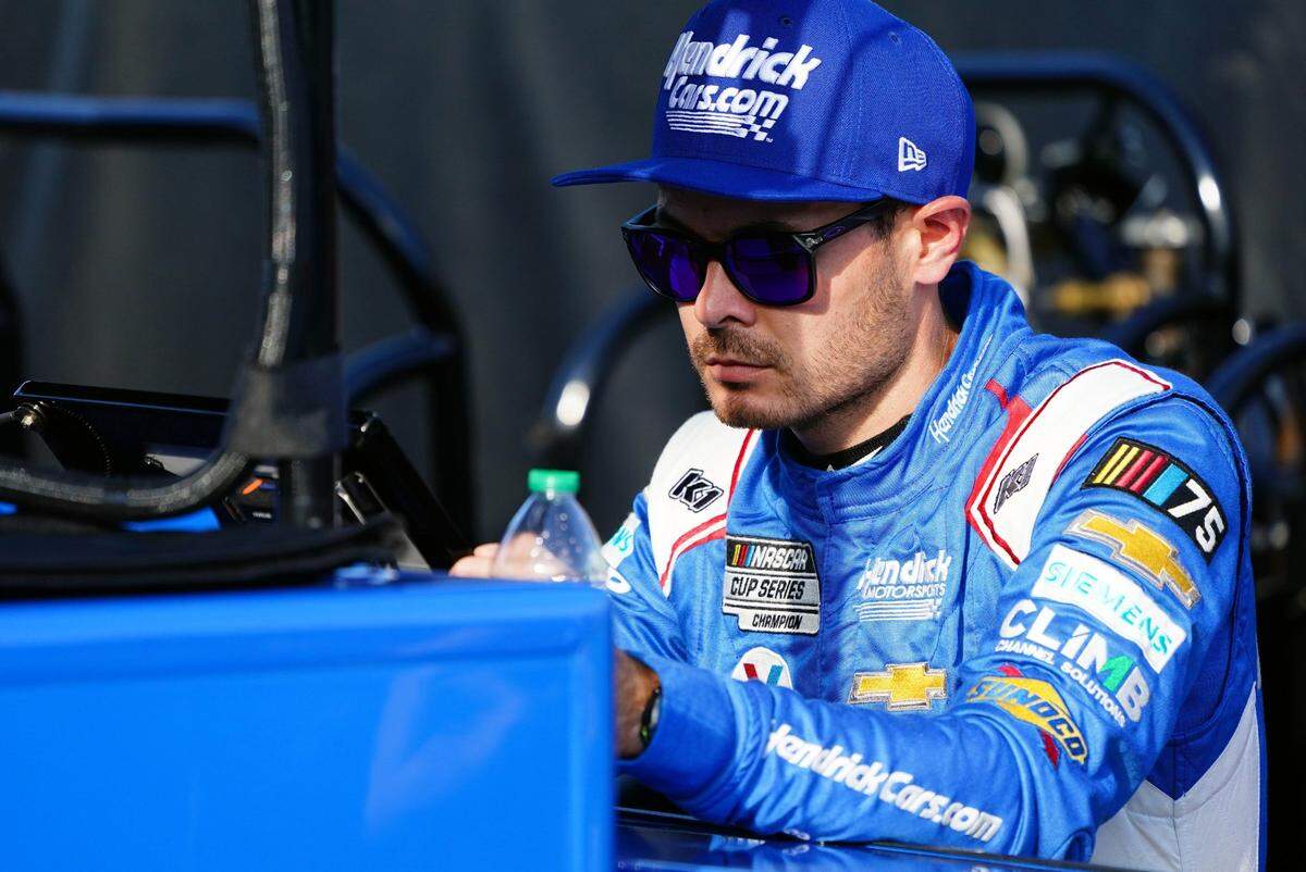 Apr 15, 2023; Martinsville, Virginia, USA; NASCAR Cup Series driver Kyle Larson (5) monitors drivers during qualifying at Martinsville Speedway. Mandatory Credit: John David Mercer-USA TODAY Sports