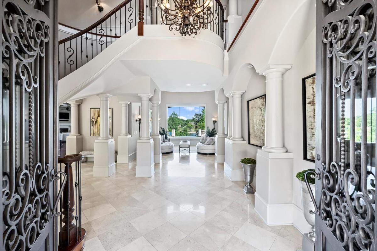 The mansion includes “extensive architectural detailing, soaring ceilings and custom millwork,” Michelle Rhyne, global real estate adviser with Premier Sotheby’s Lake Norman office said in a statement.