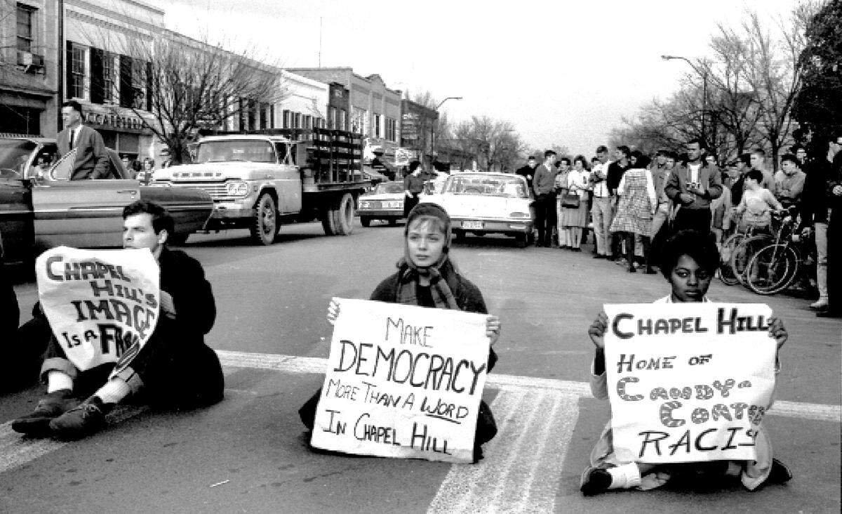 A scene from Franklin Street during a 1964 civil rights demonstration in Chapel Hill.