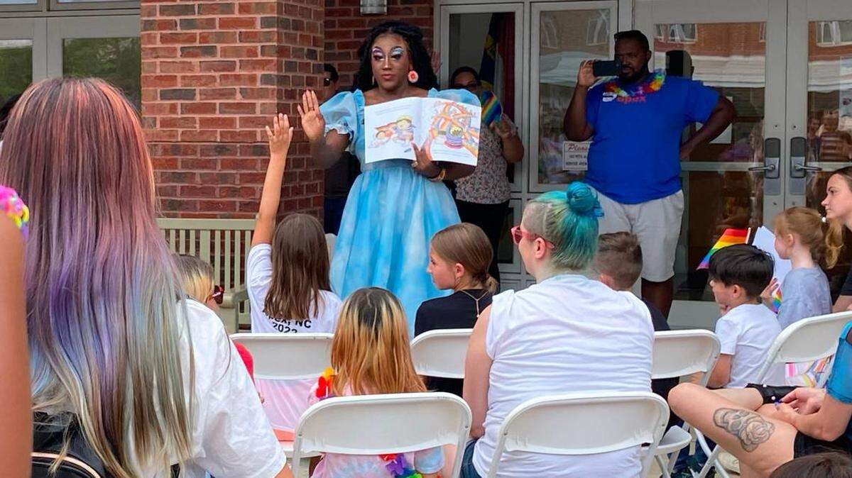 Drag queen “Stormie Daye” reads to children and parents at the Apex Pride Festival during Drag Queen Story Hour, June 11, 2022. Republicans in the N.C. House have filed a bill April 18, 2023 that would ban drag performances in public places.