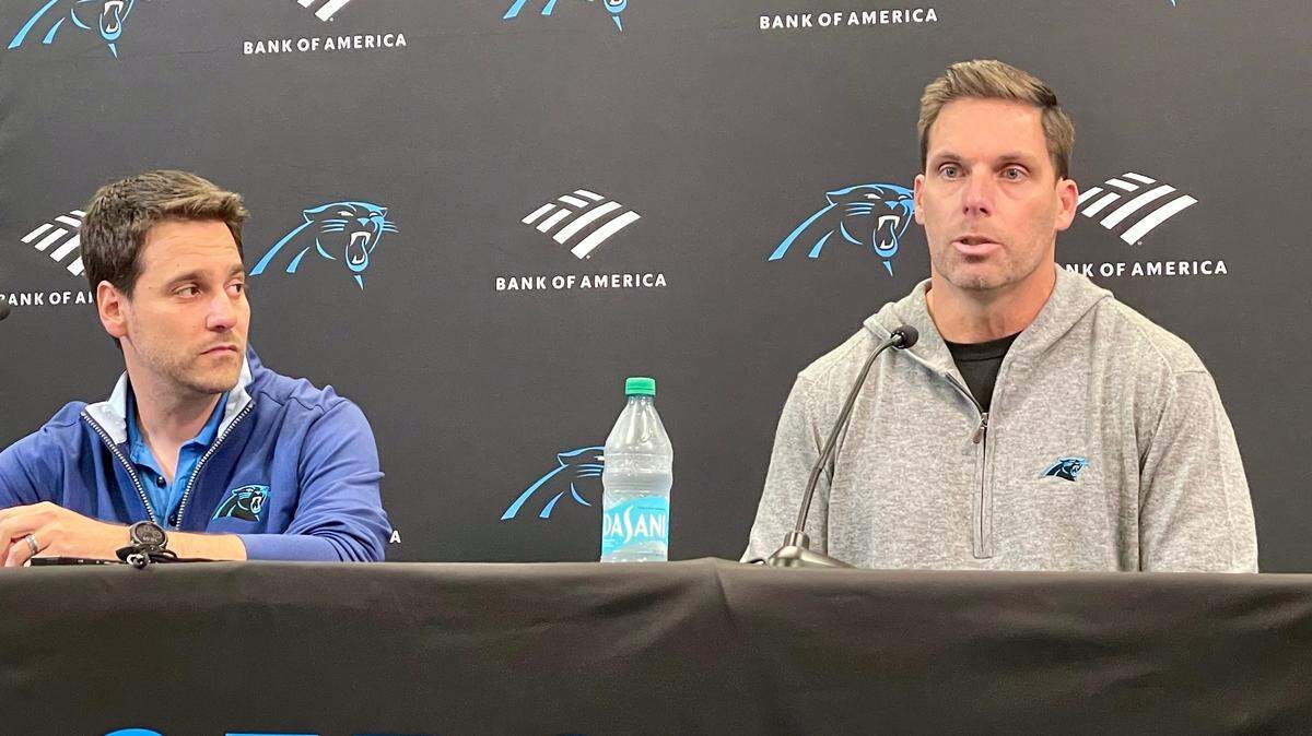 General manager Dan Morgan (right) and VP of Football Operations Brandt Tilis (left) address the media Thursday, August 29, 2024, after an eventful few days of polishing the Carolina Panthers’ 53-man roster.