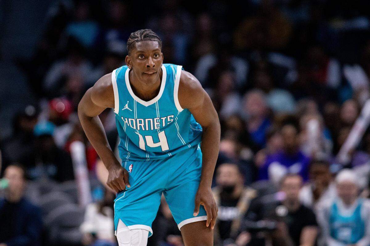 Mar 8, 2025; Charlotte, North Carolina, USA; Charlotte Hornets forward Moussa Diabate (14) looks on during the third quarter against the Brooklyn Nets at Spectrum Center. Mandatory Credit: Scott Kinser-Imagn Images