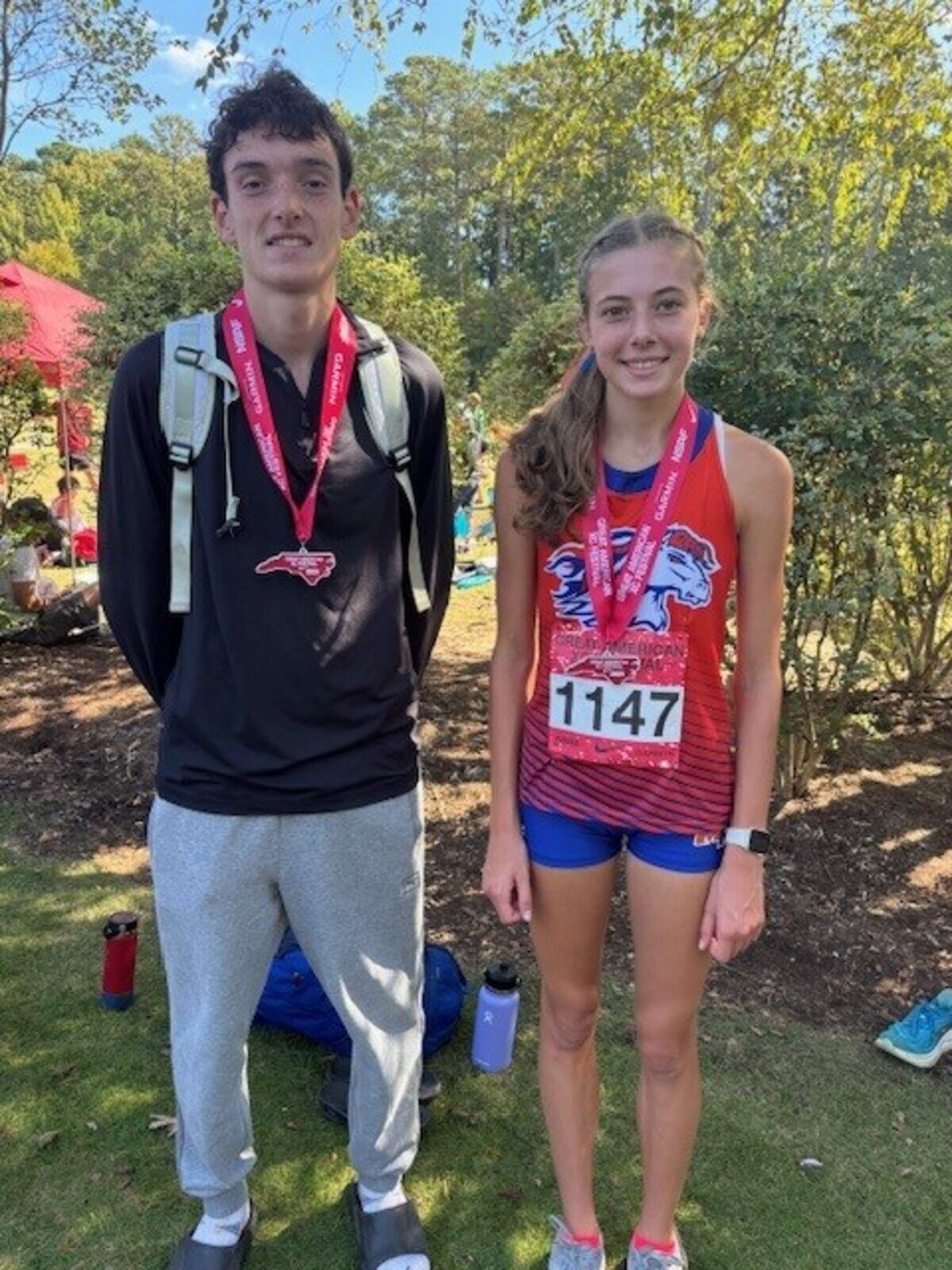 Marvin Ridge track stars Michael Rivlin and Caitlin Kasten