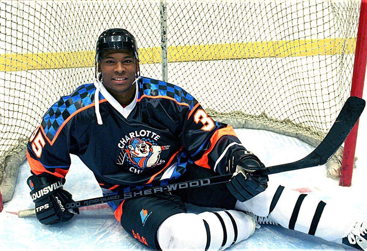 In 1994, Shawn Wheeler posed on the ice prior to a Charlotte Checkers season in which he was both a player and assistant coach. A star minor-league hockey player in the 1990s for several teams, Wheeler was inducted into the ECHL Hall of Fame in 2024.