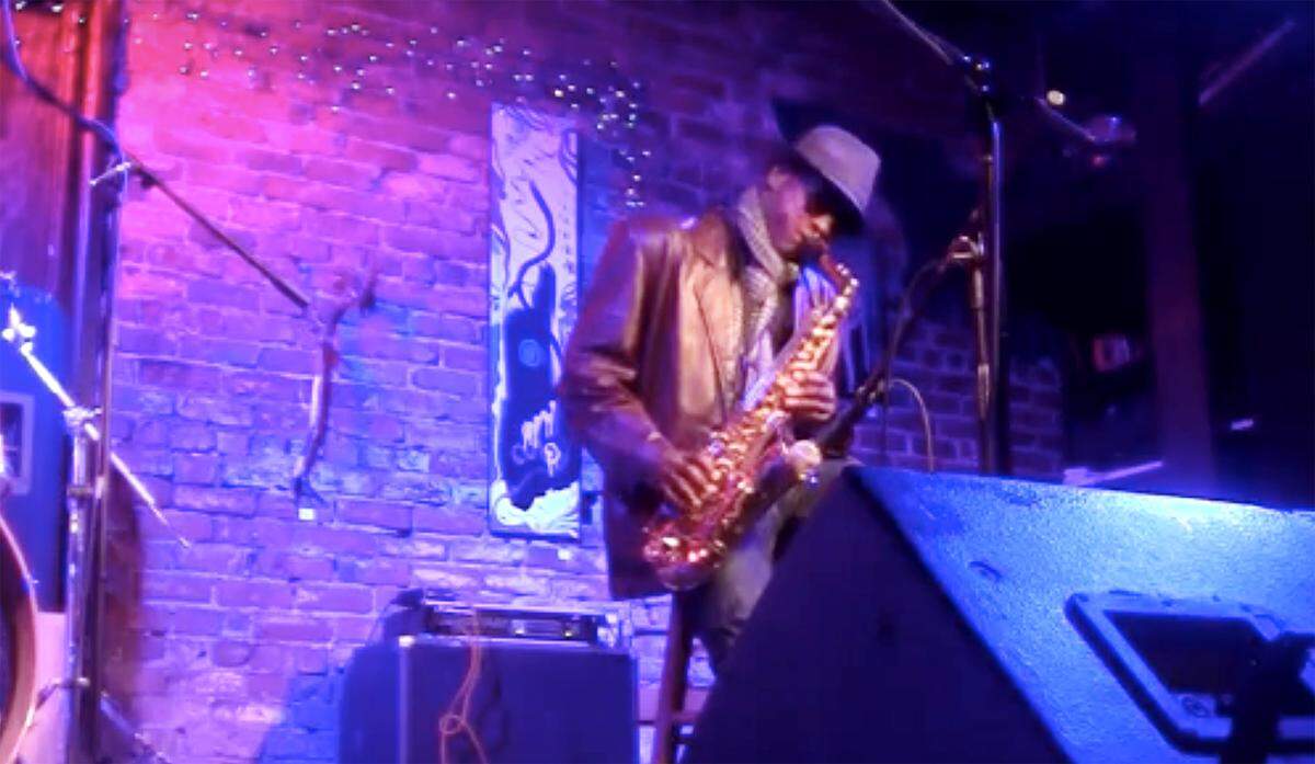 one of 13 music venues that makes up the Charlotte Independent Venue Alliance. The group is seeking financial relief since such entertainment remain closed amid the COVID-19 pandemic. Will “Saxman” Smith plays the saxophone during a show in this file photo at the Evening Muse.