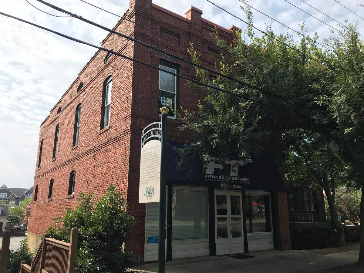 The Leeper & Wyatt Store at 1923 South Blvd. was built around 1903 as a grocery store for Dilworth and the Atherton Mill village. A Nashville developer has proposed to build a high-rise apartment tower on the property, threatening the building’s future.