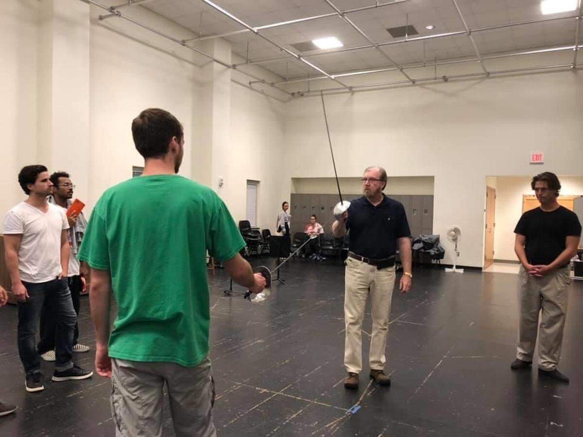 Tom Hollis directs actors as they prepare for CPCC’s production of “Shakespeare in Love” in 2019.