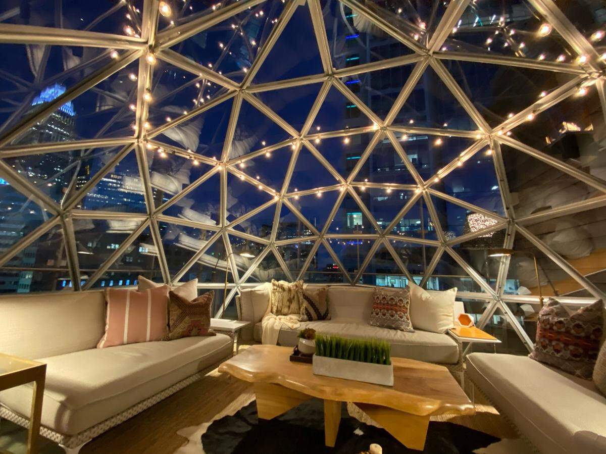 Dine with a view when you reserve an igloo on the Merchant & Trade rooftop patio.&nbsp;