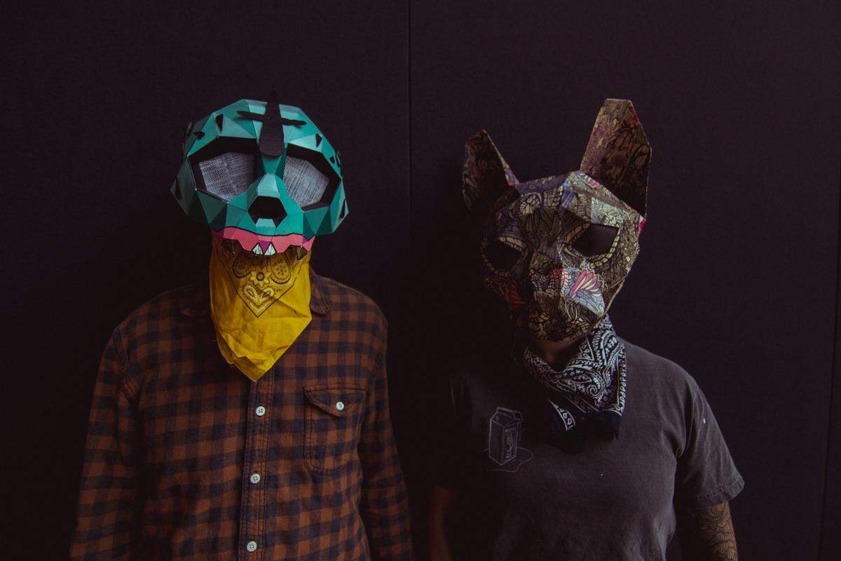 This portrait of Charlotte artists Arko and Owl was taken at the Mint Museum Uptown. They use aliases and masks to keep their art and real identities separate.