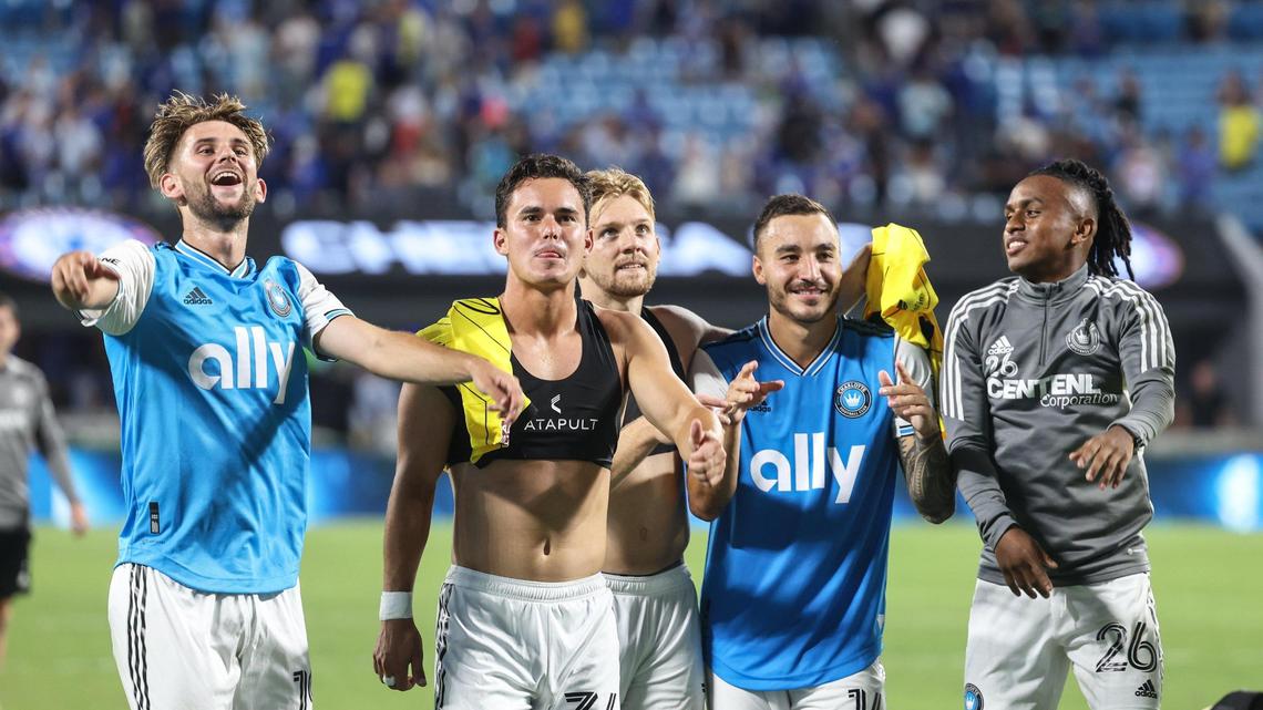 Charlotte FC players celebrate with fans after their win against Chelsea at the Bank of America Stadium in Charlotte, N.C., on Wednesday, July 20, 2022.