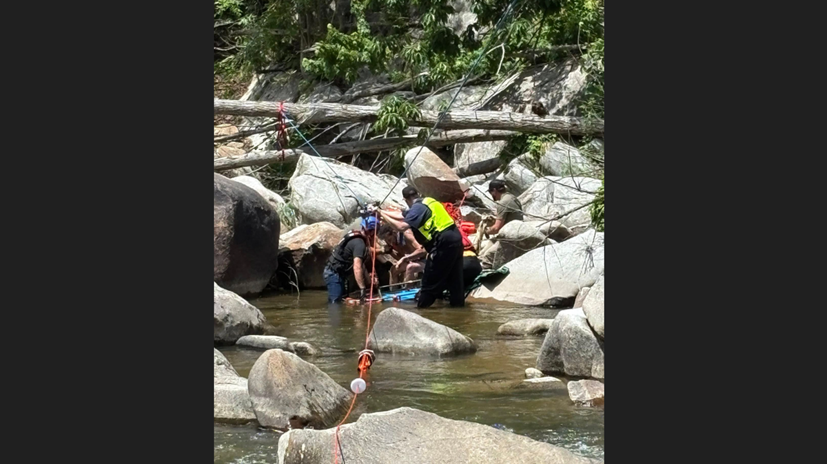 A seriously injured man was found trapped in North Carolina’s Watauga River after he fell off a cliff, rescuers say.