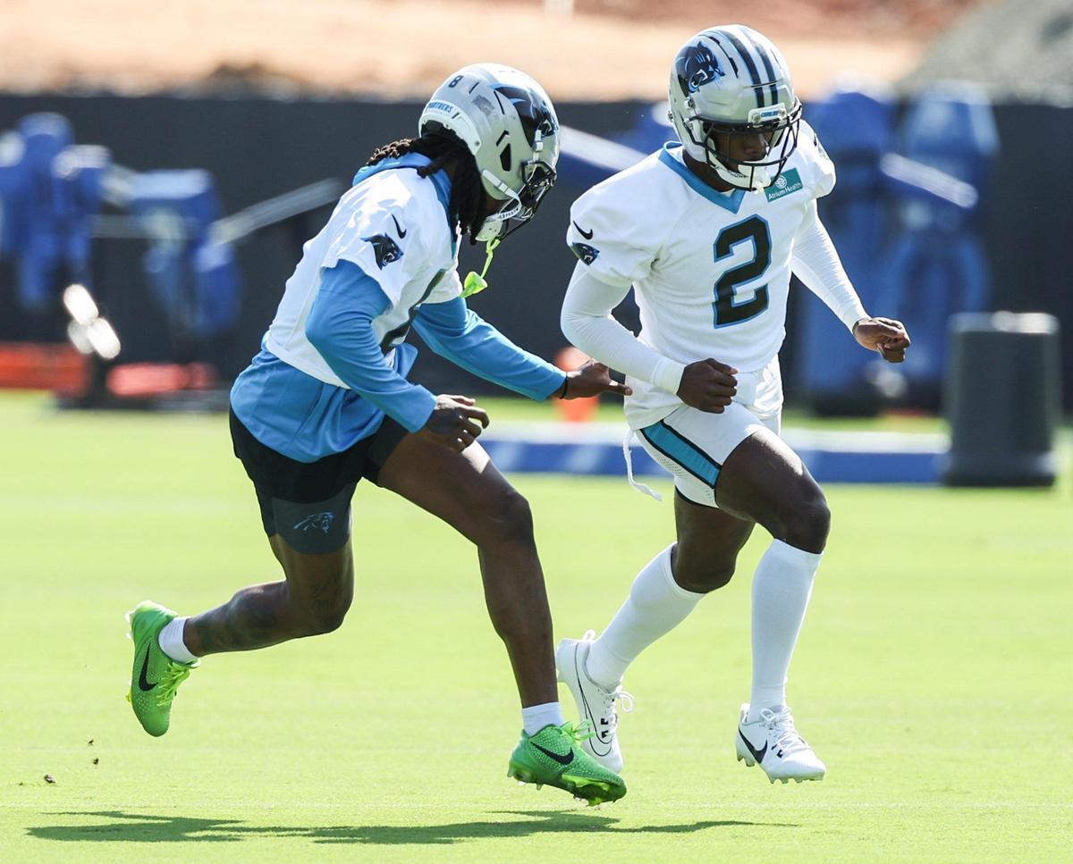 Panthers cornerbacks Jaycee Horn, left, and Mike Jackson run through a drill during training camp in Charlotte, NC on Wednesday, July 24, 2025.