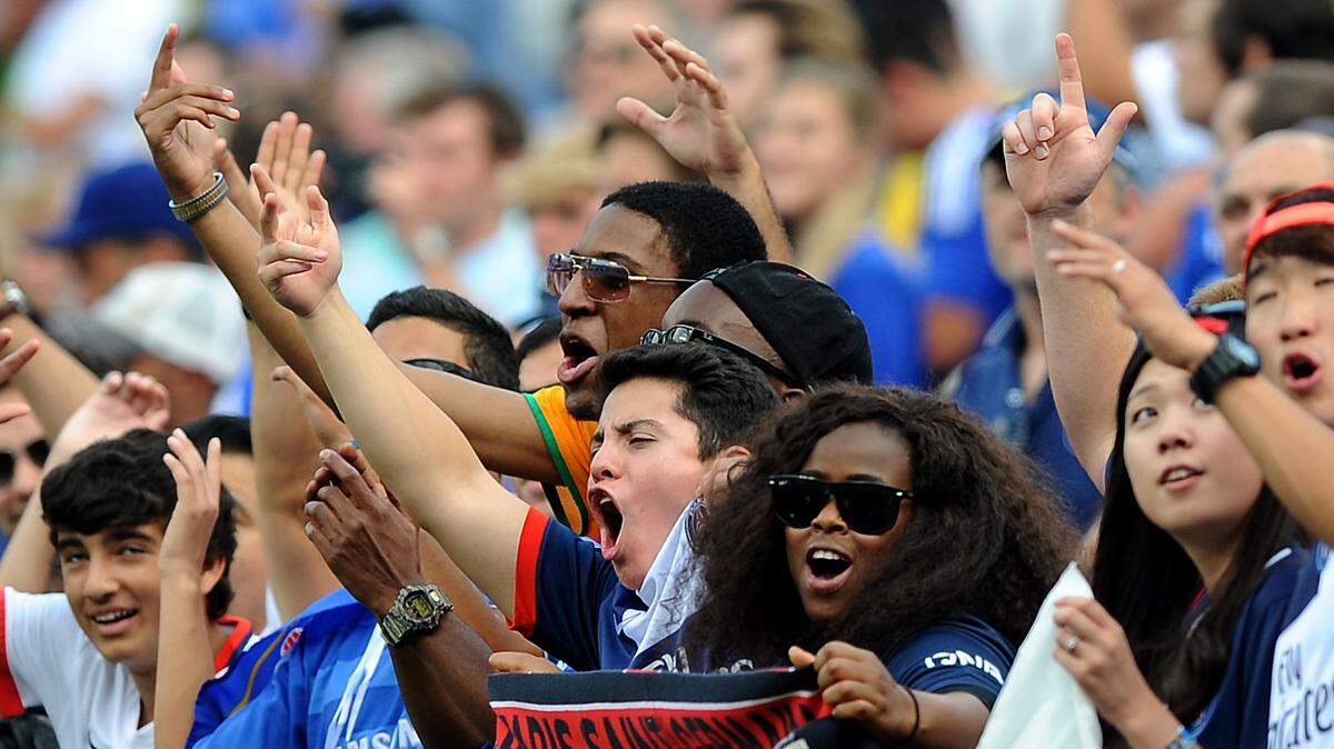 Paris Saint-Germain fans cheer on their team vs Chelsa in the International Champions Cup soccer match at Bank of America Stadium in Charlotte, NC on Saturday, July 25, 2015.
